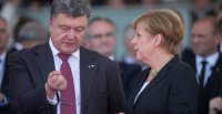 Порошенко и Меркель говорят о возможном срыве мирного урегулирования