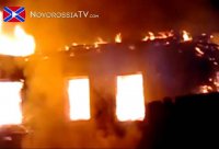 Артдуэли в аэропорту, пылающие дома, ограбленные карателями жители в Песках - хроника из прифронтовой зоны ДНР