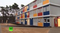 В Германии беженцев размещают в специальных «контейнерных» городках