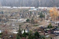 Украинские каратели расстреляли кладбище у донецкого монастыря