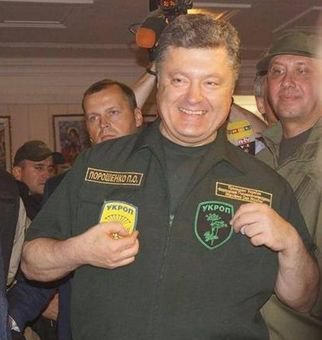 Порошенко: маскарад с войной за пазухой