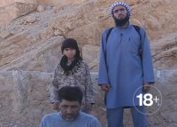 10-летний мальчик из ИГИЛ отрезал голову пленнику (ВИДЕО +18)