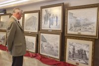 В день решения об использовании войск за границей в Совете Федерации открылась выставка о Новороссии