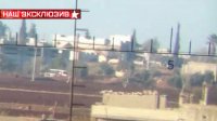 Ракета сирийской армии уничтожает машину террористов: кадры через прицел