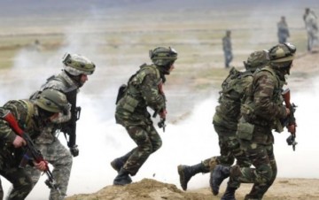 Азербайджан возвращает добровольцев