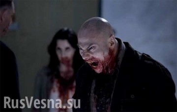 Шок: Украинская нацистка учит своих детей каннибализму