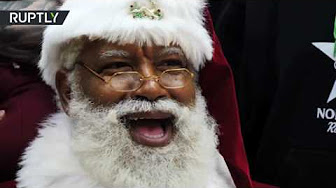 Пиндосы следующий Санта у вас будет или гей, или педофил, или баба бородатая, а пока слушайте поздравление от темнокожего Санта-Клауса