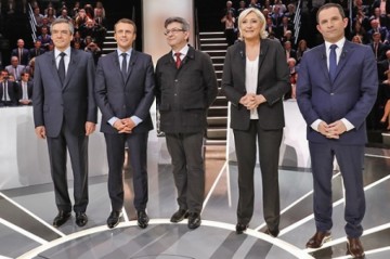 Теледебаты во Франции прошли на фоне противостояния Макрона и Ле Пен