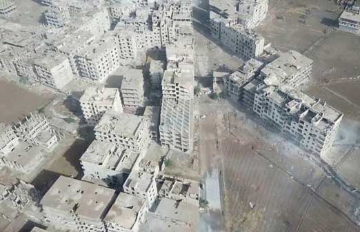 Беспилотник снял ликвидацию котла ИГИЛ в руинах южного Дамаска