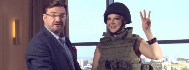 Жена убитого в Киеве перебежчика устроила милитари-цирк