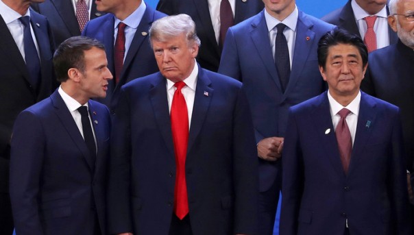 Трамп все же поздоровался с Путиным и объяснил отмену встречи