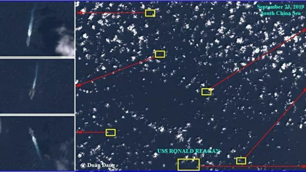 Опубликовано фото авианосца ВМС США в окружении китайских кораблей