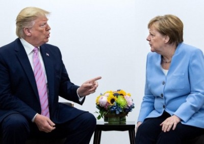Из-за конфликта с Трампом  Меркель отказалась от участия в G7