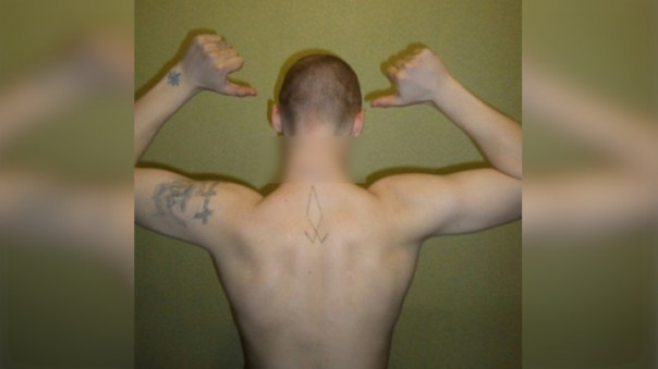 За экстремистскую татуировку новосибирца приговорили к двум годам колонии