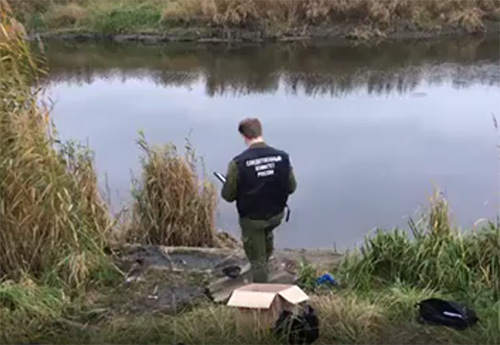 Скелет ребенка в сумке с гирей обнаружили в реке (Видео)