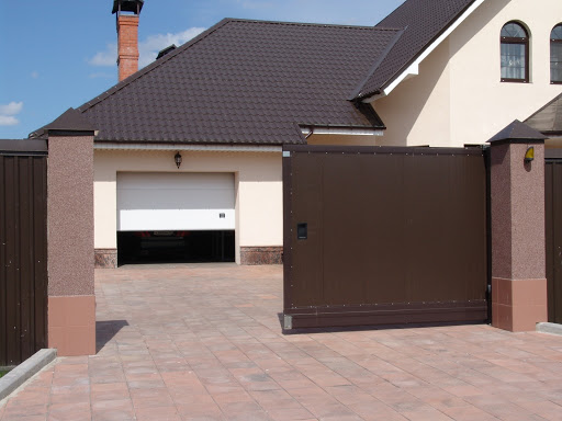 Подъемные ворота для гаража — особенности, виды